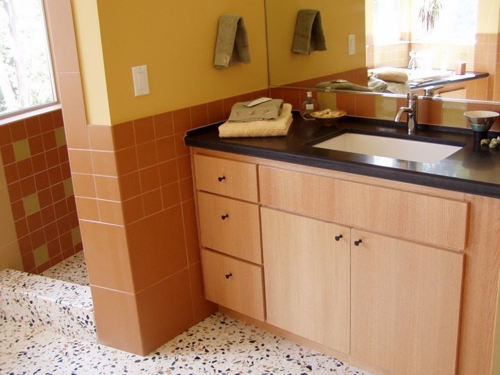 Evergreen & Leimert 019.jpg - This is the room where the color balance varies shot by shot. I like the warm colors and black countertop a lot. The floor is a bit busy for me.